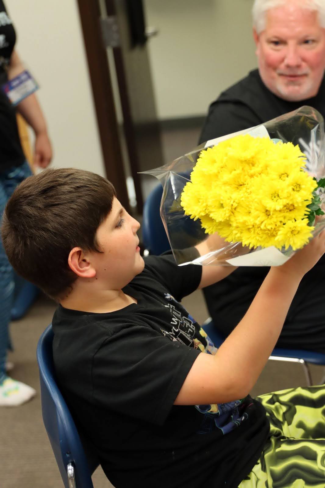 Oliver Smelling Flowers